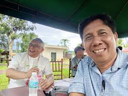 Publisher Nestor L. Abrematea, Ph.D, and Rev. Msgr. Ramon B. Aguilos of the  Leyte-Samar Heritage Society are shown here during the Suman Festival at  Plaza Triumpo, Carigara, Leyte, Dec. 9, 2025.