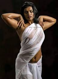 Topless Desi MILF shows her nude boobs behind a transparent saree