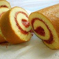 A swiss roll, jelly roll, roll cake, cream roll, roulade or swiss log is a type of rolled sponge cake filled with whipped cream, jam, or icing. Swiss Roll Panlasang Pinoy Recipes Tasty Query