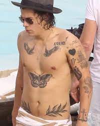 Add to favorites quick view harry styles chest temporary tattoo temp tat large big halloween purim cosplay costume accurate moth butterfly swallows leaves 17. Best 35 Harry Styles Tattoos And Tattoo Ideas Nsf Music Magazine