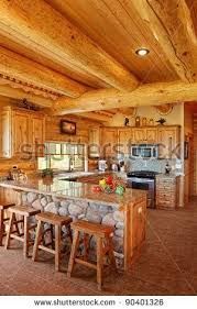 Log Cabin Interiors The Interior Of A Modern Log Cabin Stock Photo 90401326 Shutterstock Loghomedecora Log Home Kitchens Log Cabin Kitchens Cabin Kitchens