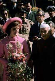 A Vibrant Pink Rajah Inspired Coat By Oleg Cassini And A Matching Halston Hat Jackie O Jacqueline Kennedy Jackie Kennedy Jacqueline Kennedy Onassis