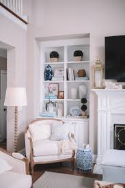 Round wood coffee table with lattice sides. Our Living Room Reveal Southern Curls Pearls