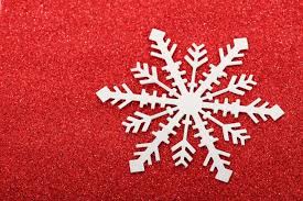 A gold leaf effect wreath featuring snowflakes, holly and berries. How To Make Paper Snowflakes Easy Snowflake Decorations The Old Farmer S Almanac
