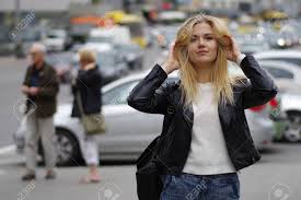 He has blond hair and blue eyes. A Nice Girl Is Posing In A Street She Has Long Blonde Hair And Stock Photo Picture And Royalty Free Image Image 89666586