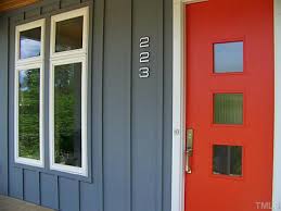 Many modern glass front doors are set into a complete glass wall. Front And Center Color When To Paint Your Door Bright Red