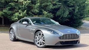 Image result for Titanium Silver 2014 Aston Martin
