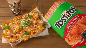 I open a jar of salsa con queso medium hot cheese dip and eat it with tostitos original restaurant style tortilla corn chips. Fritolay Tailgate Meal Of The Week Tostitos Salsa Verde Nachos 2019 Week 5