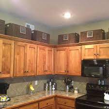 11 Ideas For Organizing Your Kitchen Above Kitchen Cabinets Kitchen Cabinets Decor Budget Kitchen Remodel