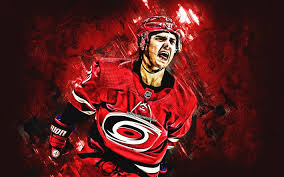 Coming to the carolina hurricanes with much fanfare, sebastian aho is already becoming an last season was an incredible one for young sebastian aho. Download Wallpapers Sebastian Aho Carolina Hurricanes Nhl Finnish Hockey Player Portrait Red Stone Background Hockey For Desktop Free Pictures For Desktop Free