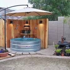 How To Make An Interesting Art Piece Using Tree Branches Ehow Backyard Backyard Pool Stock Tank Pool