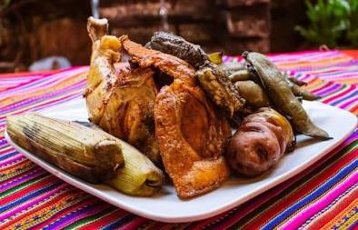Pachamanca, the traditional underground-cooked meal served during Inti Raymi.