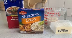 In an 8×8 baking dish add the rice, onion soup, beef broth and top with the butter slabs. Stick Of Butter Rice Nobiggie