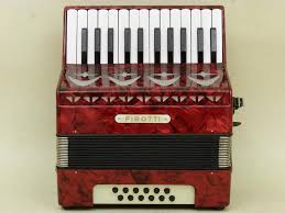 very nice red german piano accordion firotti 12 bass with