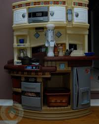 After several hours of using our considerable strength to try and push the seat pegs in, we sprayed them with pam and they did slide in easily. Kid Tested Step2 S Master Chef Kitchen