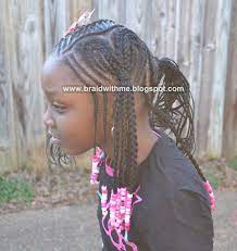 This is one of the classic and elegant box braids look amazing with a tank top and jeans. Beads Braids And Beyond February 2012 Braided Hairstyles Little Girl Braids Girls Hairstyles Braids