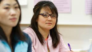 Hmong moms learn English while kids are tutored