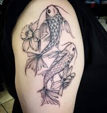 Rib to thigh koi tattoo with lotus. 30 Koi Fish Tattoo Designs And The Meaning Behind Them Saved Tattoo