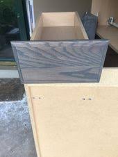 First Coat Of The Minwax Clear Tint Base Charcoal Grey Stain On My Unfinished Oak Cabinets Both Pur Staining Oak Cabinets Oak Cabinets Painting Oak Cabinets