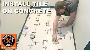 Best way to lay floor tiles on concrete. How To Install Tile On Concrete Home Repair Tutor