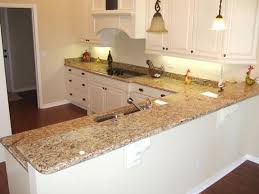 Stained wood cabinets compliment venetian gold's light earthy tones, creating a naturally inviting kitchen that is seamless from cabinets to countertop. Cabinet Color Backsplash Paint Color Help With Venetian Gold Venetian Gold Granite With White Cabinets Style And Des Venetian Gold Granite Cabinet Style Home