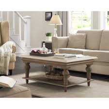 Enhance Your Home Decor With The Elements Coffee Table Crafted From Solid Wood With Turned Legs Optional Shelf With Images Coffee Table Sofa End Tables Chic Coffee Table