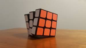 Rotate the back face of the cube 90 degrees counterclockwise. How To Solve A Rubik S Cube In 2 Move Exposed How People Actually Do It Rubiks Cube Solving A Rubix Cube Cube