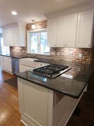 Brick Back Splashes Are So On Trend Brick Looks Stunning With White Cabinetry Achieve This Look With Our Fremont C Brick Kitchen Kitchen Design Home Kitchens