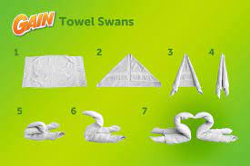 How to fold bath towels. Who Doesn T Love A Towel Swan Here S How To Make Your Own Client Towel Swan How To Fold Towels Diy Towels