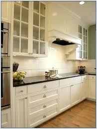Backsplash For Cream Cabinets For Cream Cabinets Cream Cabinets White Subway Tile Whit Glass Fronted Kitchen Cabinets Black Granite Countertops Kitchen Remodel
