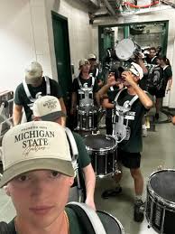 My kids have both graduated from high school now, but I have one more kid  left in college marching band. The MSU drumline welcomed the Detroit Lion's  drumline to kick off the