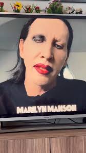 Marilyn Manson gives a message at back to the beginning concert