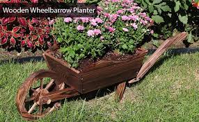 Free shipping on qualified orders. Amazon Com Sunnydaze Wooden Decorative Wheelbarrow Planter For Patio Lawn And Garden 35 X 10 X 11 Inches Patio Lawn Garden