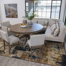 Elevated dining sets like this one are perfect for smaller rooms where floor space is hard to come by. Gwyneth Dining Set Jerome S Furniture Wood Dining Room Table Dining Room Table Set Dining Room Bench Seating