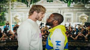 Logan paul, left, towers over floyd mayweather during their media availability this week. Opk7wpuqkr1epm