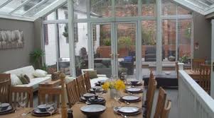 Proceed down the hall to the dining room with varnished wooden floorboards, a fireplace having a multi fuel stove and a feature bay window to the side. Ashbourne Hall Ashbourne Accommodation