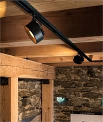 Look for lighting manufacturers that make sloped ceiling canopies and shop for chandeliers and hanging pendants made by those manufacturers. Recessed Track Light System Lighting Styles