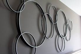25 Diy Projects Using Embroidery Hoops Diy Pottery Circle Wall Art Diy Wall Decor