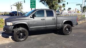 2002 Lifted Dodge Ram 1500 4dr Quad Cab Super Clean Four Door Truck Gives You The Room The V8 Gives You The Power And P Trucks Lifted Dodge Dodge Ram 1500