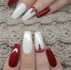 Coffin acrylic nails are very fashionable because coffin shaped nails are one of the most popular nail shapes. 30 Red Glitter Coffin Nails For Winter Makeup Inspiration Red Christmas Nails Christmas Nails Xmas Nails