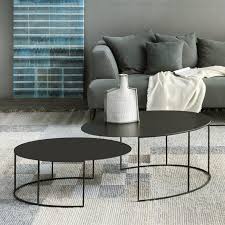 A beautiful coffee table can be the centerpiece of your space, even on its own. Zeus Slim Irony Oval Coffee Table Ambientedirect