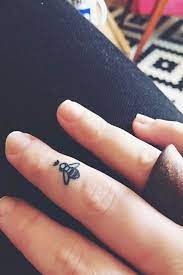40 Tiny Yet Meaningful Finger Tattoo Ideas Tiny Finger Tattoos Meaningful Finger Tattoos Finger Tattoo For Women