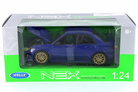 The japanese automaker's brand new motorsports livery takes after the subaru world rally team cars of the 1990s and 2000s, boasting a star cluster graphic to go with the blue and gold theme. 2005 Subaru Impreza Wrx Sti Dark Blue W Gold Rims Welly 22487ns W Bl 1 24 Scale Diecast Model Toy Car Walmart Com Walmart Com