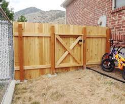 You see a wooden fence gate in the settlement of.. Build A Wooden Fence And Gate 13 Steps With Pictures Instructables