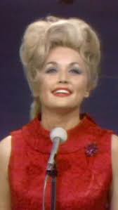 I'm always in costume at Christmas. If I'm not in a Santa suit, I wear reds  and greens. I wear sweaters with Christmas lights