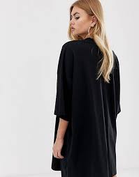 You'll be earning style points in a basic women's t shirt dress styled down with fresh sneaks and an oversized denim jacket. Asos Design Oversized T Shirt Dress In Black Asos