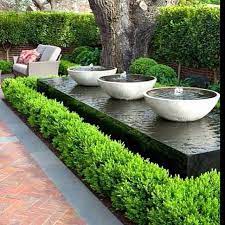 Water feature is one or more items from a range of fountains, pools, ponds, cascades, waterfalls, and streams that is part of landscaping and garden design. Instagramdesign On Instagram Tranquility The Sound Of Gently Bubbling Water And The Fountains Backyard Water Features In The Garden Backyard Water Feature