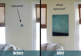 She built frames from inexpensive lumber and cover with fabric, stapling on the back of the frame, and hang it to cover the breaker box. 21 Ingenious Ways To Hide The Mess And The Eyesores In Your Home