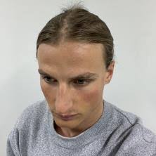 Avat3r: Large Animatable Gaussian Reconstruction Model for High-fidelity 3D  Head Avatars