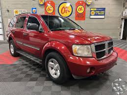 Image result for Deep Coral Red 2007 Durango